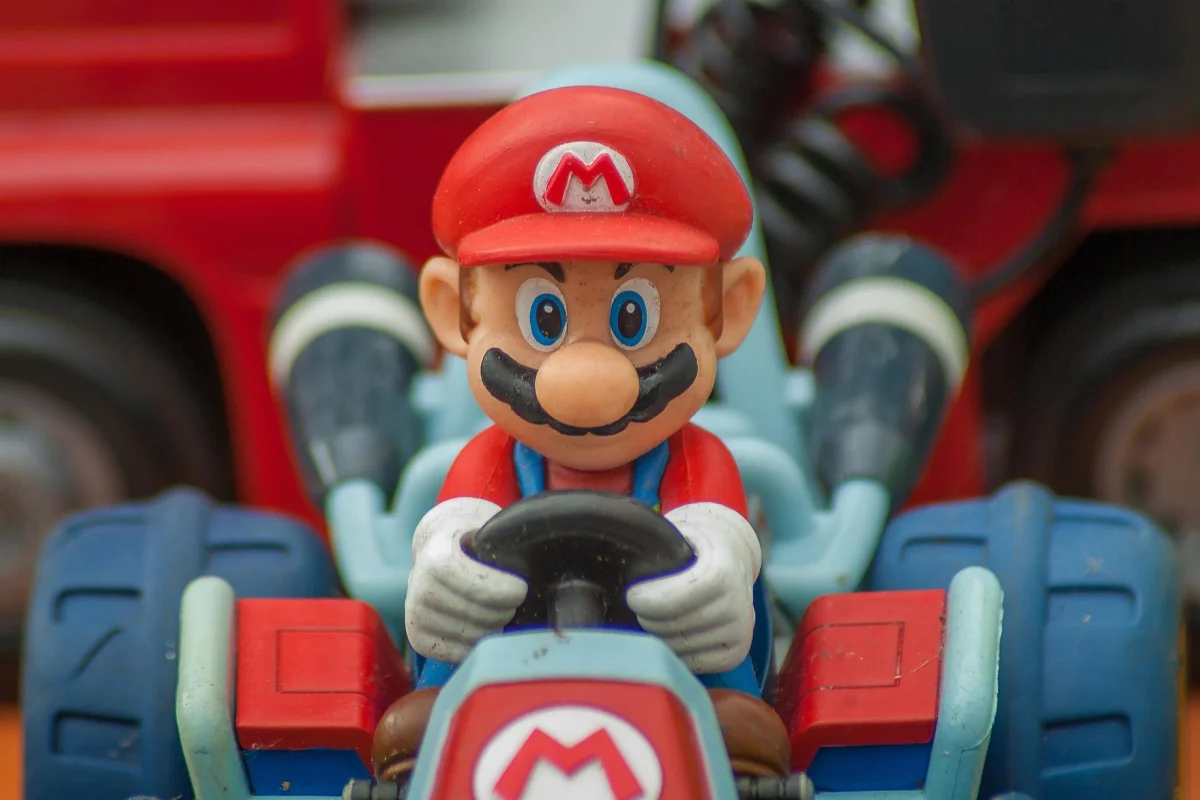 Close-up of Mario driving his iconic racing kart, representing the exciting gameplay and racing action in Nintendo Mario Kart Tour.